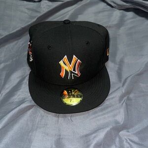New Era Black Cap with Orange and Yellow Logo